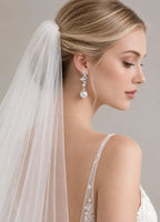 Lunalice twisted CZ vine pearl drop earrings - elegant bridal wedding statement jewelry, front view